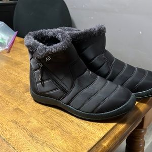 AB BOOTS. Winter booties. Never worn. Quilted nylon outer. Fuzzy inside.